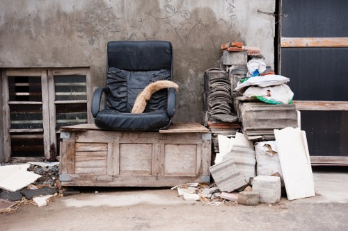 Community members participating in furniture disposal event in Staines